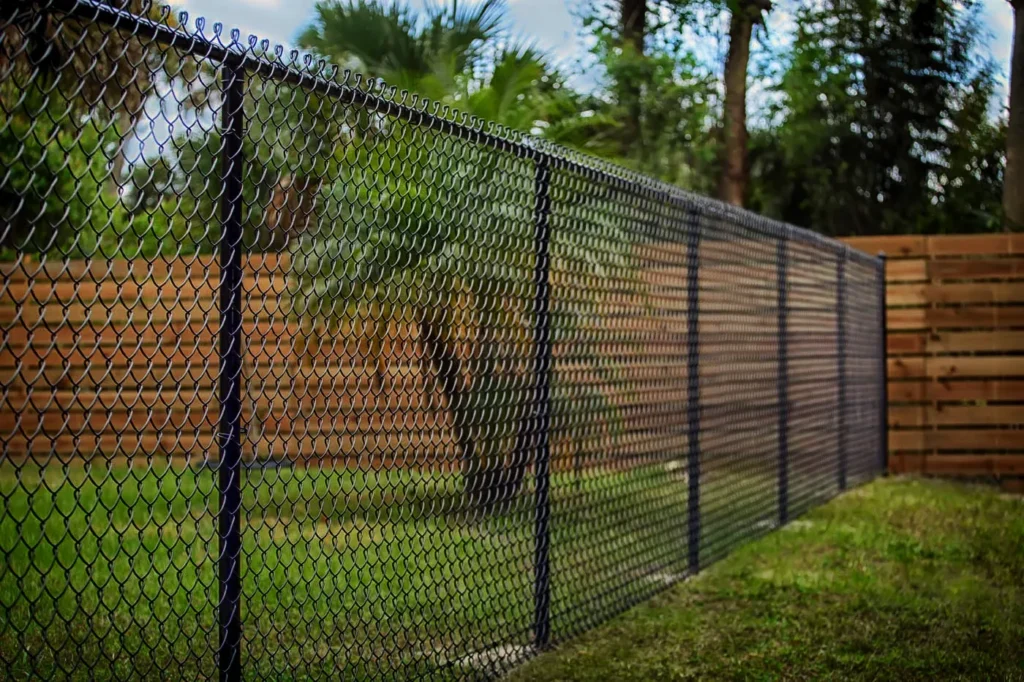 “Chain link fence installation in San Antonio backyard by Comal Fence